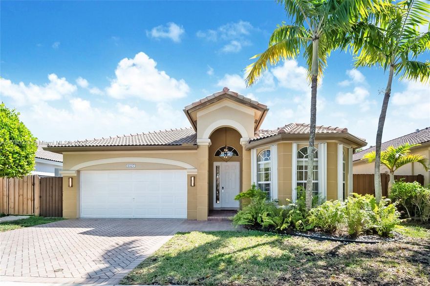 Step into luxury in this fully remodeled home in Islands of Doral! Featuring a gourmet kitchen with quartz countertops, waterfall island, and sleek cabinetry. Modern bathrooms and an opulent master suite with a custom dream closet—formerly the 4th bedroom—offer unmatched elegance. The backyard is an oasis with a covered terrace, perfect for entertaining. Two-car garage. Enjoy resort-style amenities: clubhouse, pool, tennis, basketball, gym, and tiki huts by the lake. A must-see!