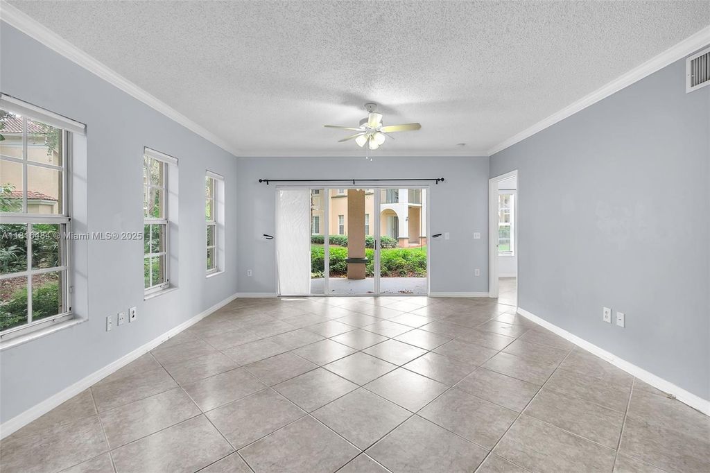 Photo of 2474 Centergate Dr #101, Miramar, FL 33025 (MLS # A11816484)