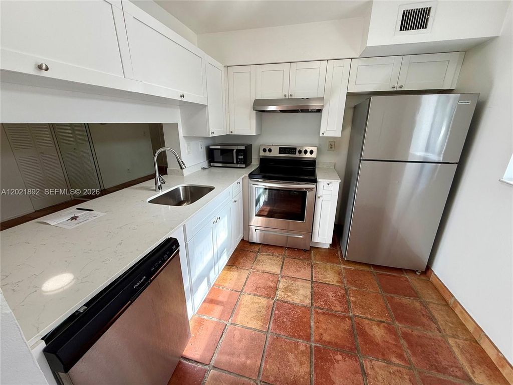 Photo of 110 Gardens Dr #203, Pompano Beach, FL 33069 (MLS # A12021892)