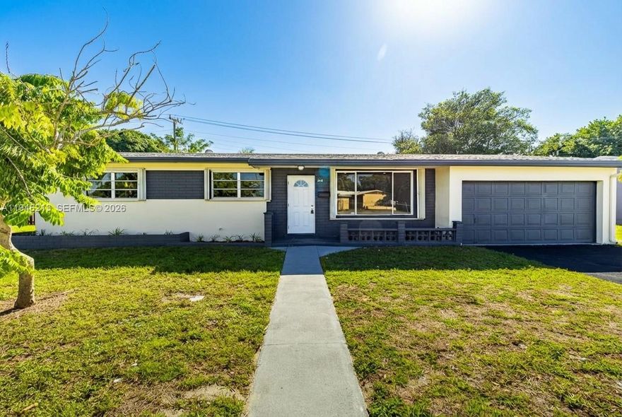 Fully renovated 4BR/3BA home with 2-car garage and 2,017 SF living area. Includes efficiency ready to rent, solar panels, impact shutters, new kitchen with quartz tops, new baths, new floors, stainless-steel appliances, fenced backyard, and prime location near the stadium. Ready to close.