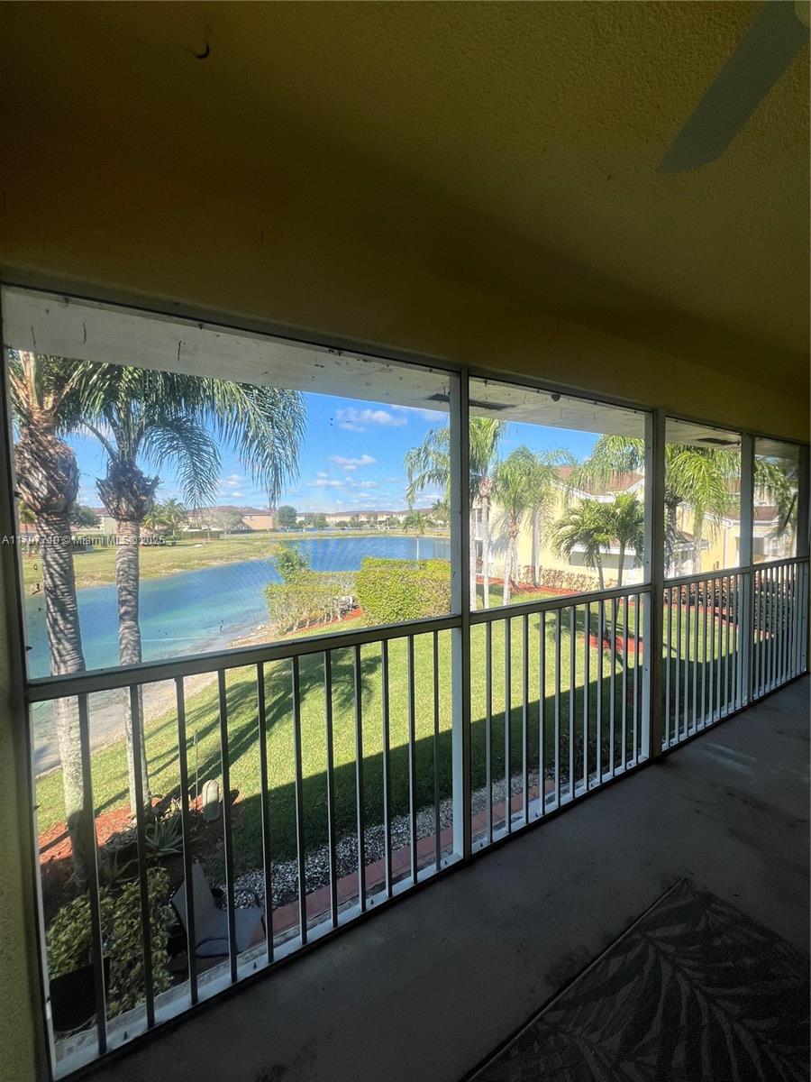 MOVE IN COST ONLY 1ST MONTH & 1 MONTH DEPOSIT. Beautiful condo for rent in Center Gate with a split floor plan and abundant natural light throughout. The spacious master bedroom features a walk-in closet, while the private patio overlooks the lake, offering serene water views. Rent inc. water, AT&T Internet and Direct TV cable for added convenience. Located in a well maintained community, this home provides easy access to shopping, dining and entertaining.