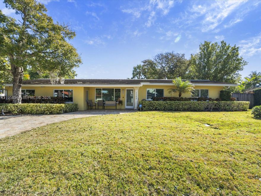 Set on a beautifully maintained, tree-lined street in prestigious Coral Ridge, this exceptional 5-bedroom home offers bright, open living designed for today’s families. Sun-filled living, dining, and family rooms flow seamlessly to a lush, manicured backyard with a sparkling pool—ideal for entertaining, play, and everyday enjoyment. The oversized primary suite features a spacious walk-in closet, and ample storage is found throughout the home. Recent upgrades include a newer roof (2022), pool pump (2022), new flooring in most areas, remodeled secondary bathrooms, and hurricane impact windows throughout. Just moments from George English Park, beaches, and top-rated schools, this private and welcoming residence delivers outstanding value in the A-Rated Bayview School District