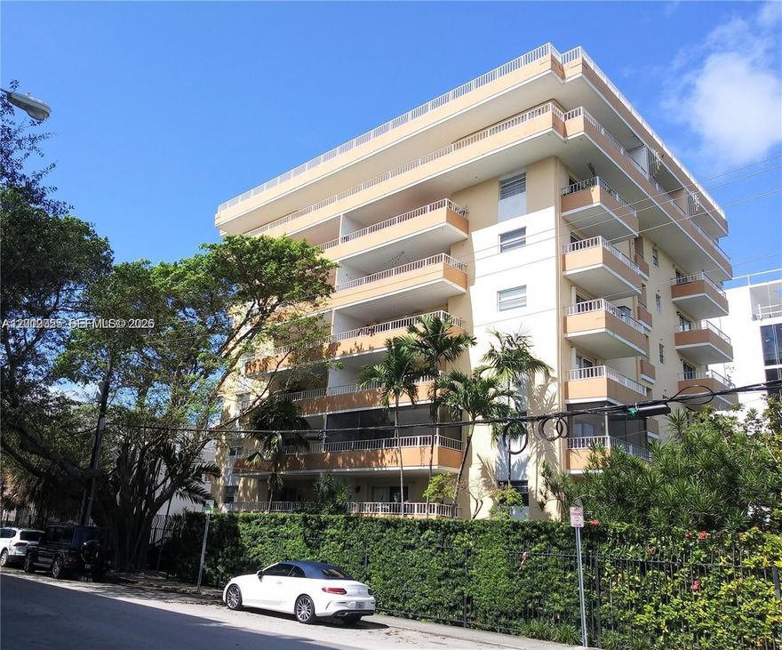 Beautiful Coconut Grove, next to Cocowalk and located directly in the heart of the village. VERY low price for a 2 bedroom unit in the Grove. Light and bright 2 bedroom, 2 bath condo with two very spacious balconies.  Updated condo with open floor plan. Owner agrees to pay Special Assessment at closing. 50 year certification being planned for immediate commencement.