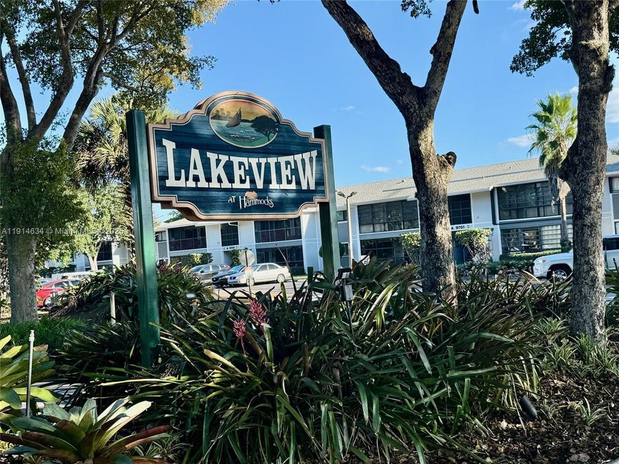 Beautifully updated 2-bedroom, 2-bath condo in The Hammocks with an amazing lake view! This move-in-ready home features brand-new laminate wood floors throughout, a fully remodeled kitchen with modern cabinetry and finishes, updated bathrooms, and fresh interior paint. The bright and open layout offers plenty of natural light and a peaceful balcony overlooking the water, perfect for relaxing at any time of day. Enjoy assigned parking plus plenty of guest spaces. The community offers a swimming pool, gym, barbecue areas, and access to all Hammocks amenities, including walking trails, clubhouse, lakes, and more. Conveniently located near shopping, dining, great schools, and major roadways. A perfect blend of comfort, style, and location!