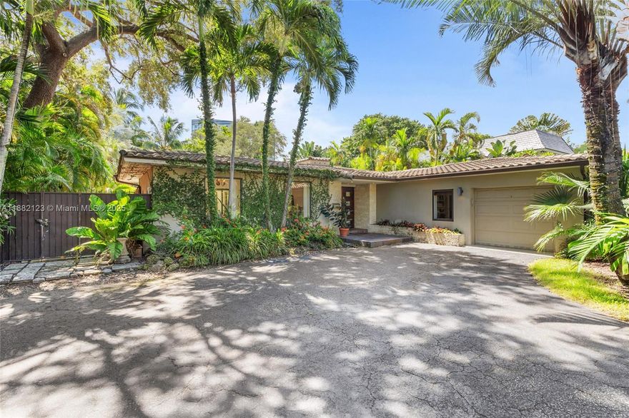 GREAT OPPORTUNITY! Modern home, nestled on a HUGE LOT (20,541 sqft) in Miami's most exclusive gated community of BAY POINT. 24/7 private security. 4 Beds / 4 Baths (3,167 sqft total). BEST LOCATION in Miami, just minutes away from the airport, beaches, Downtown, Design District and Midtown. This property offers endless possibilities for expansion or as an investment. Modern Kitchen with quartz countertops, butler's room and first class stainless steel appliances. 4 marble baths with glass enclosures. Open TV room with cherry paneling. The property boasts idyllic tropical landscaping on nearly half an acre lot, perfect for outdoor entertaining. Large illuminated pool with waterfall, granite wet bar with pro BBQ, mature palm trees and lush landscape. A MUST SEE!!