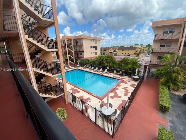LOCATION, LOCATION,LOCATION. This 2 bedroom 2 bath unit is located in Westland South condominium just east of the 826 Palmetto expressway offers ceramic flooring throughout and comes with 1 assigned parking space, laundry facility and in a gated community. Call to schedule a showing appointment.