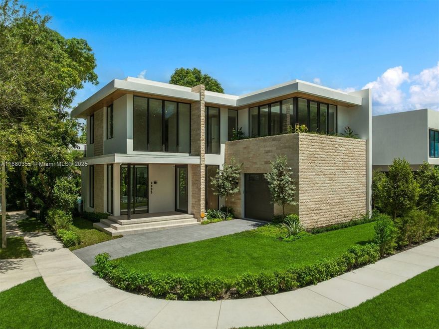Experience unparalleled luxury at 4095 Hardie Ave, a brand-new 5-bedroom, 5 full baths and 2 half
baths masterpiece, with 3,736 sq ft of air-conditioned space. Crafted by Calta Group, with
interiors by Carola Pimentel and architecture by Pacheco, this corner-lot home is moments from Coconut Grove’s
parks, top schools, dining, and entertainment. Lush landscaping surrounds a sparkling pool, Wolf BBQ, and
covered terrace with wood-paneled ceilings. Inside the home are high-impact windows, porcelain and hardwood
floors, a Savant Smart Home system, and custom Mia Cucina cabinetry. The chef’s kitchen boasts porcelain
countertops and Sub-Zero/Wolf appliances. The primary suite offers dual vanities, walk-in shower, and a soaking
tub, defining modern elegance.