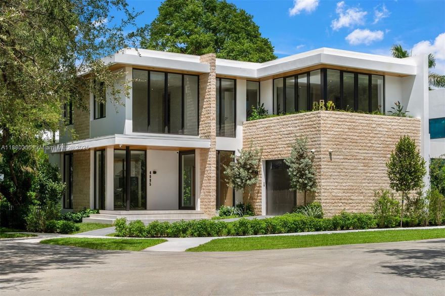 Experience unparalleled luxury at 4095 Hardie Ave, a brand-new 5-bedroom, 5 full baths and 2 half
baths masterpiece, with 3,736 sq ft of air-conditioned space. Crafted by Calta Group, with
interiors by Carola Pimentel and architecture by Pacheco, this corner-lot home is moments from Coconut Grove’s
parks, top schools, dining, and entertainment. Lush landscaping surrounds a sparkling pool, Wolf BBQ, and
covered terrace with wood-paneled ceilings. Inside the home are high-impact windows, porcelain and hardwood
floors, a Savant Smart Home system, and custom Mia Cucina cabinetry. The chef’s kitchen boasts porcelain
countertops and Sub-Zero/Wolf appliances. The primary suite offers dual vanities, walk-in shower, and a soaking
tub, defining modern elegance.