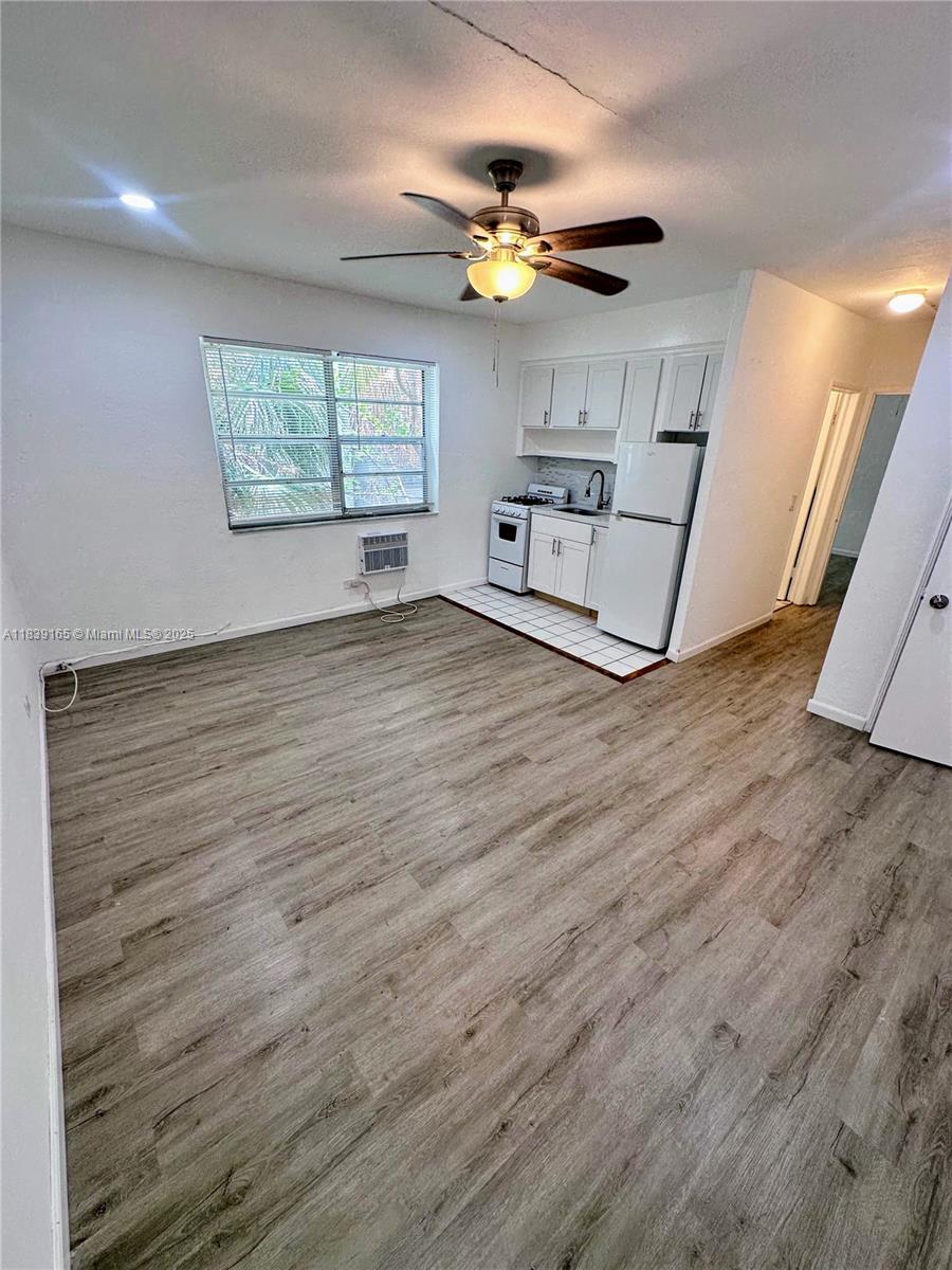 Well-maintained 1 bed, 1 bath with hardwood floors, updated kitchen, freezer, range/oven, and fridge. 650 sqft of charm and comfort. Walk everywhere—just steps to the beach, shops, and parks. Membership to community beach and cabana club included. Historic building featured in Best Small Towns in America! Quaint, town is a designated turtle nesting site. Hot water, water, and sewage included. Gas $25/month. 1 parking space. Lease: 12 months. Move-in: first, last, and $1,875 security ($5,625 total to move in). No pets allowed. Tenant pays all utilities. Enjoy a truly unique rental opportunity in a friendly neighborhood
