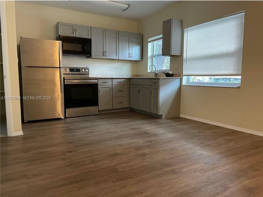 Large STUDIO east of US1 nicely remodeled. Large fenced in and private patio area. Just around the corner from golf course, Young Circle Park, restaurants, shops and more. 1 reserved car space. Safe area with great neighbors. All impact windows. Rent includes water, trash removal, sewer, landscaping. Credit and background report to apply.