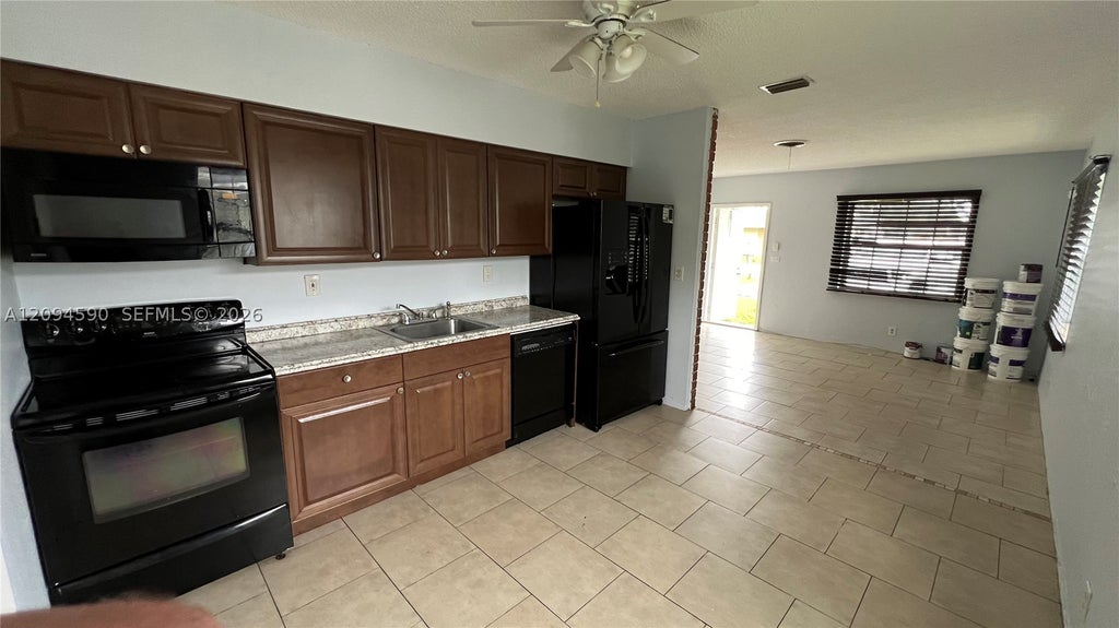 Photo of 6021 SW 36th Ct #E &amp; W, Miramar, FL 33023 (MLS # A12094590)