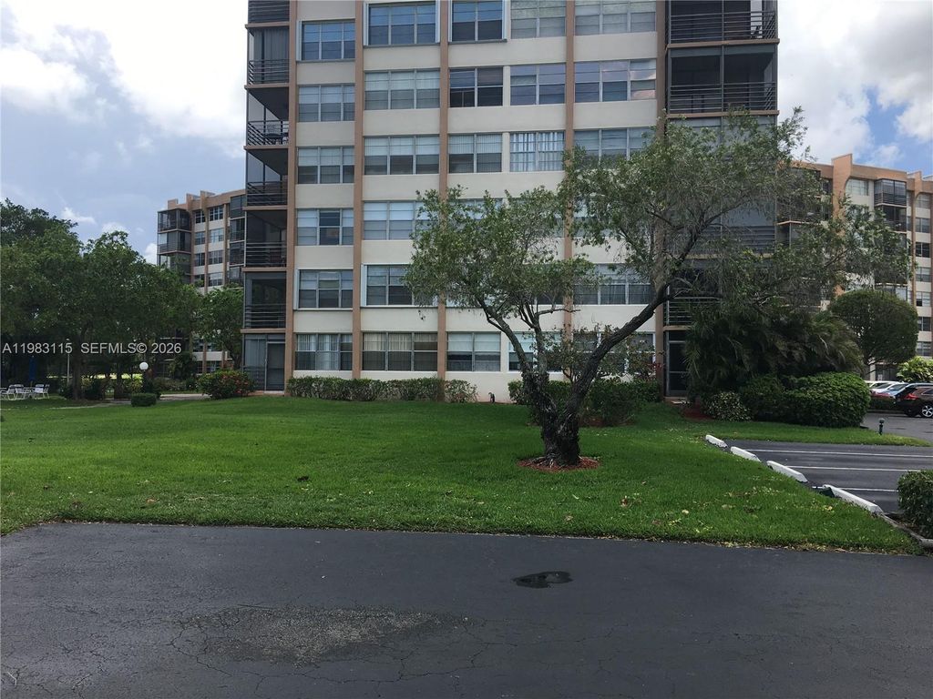 Photo of 1100 Saint Charles Pl #215, Pembroke Pines, FL 33026 (MLS # A11983115)