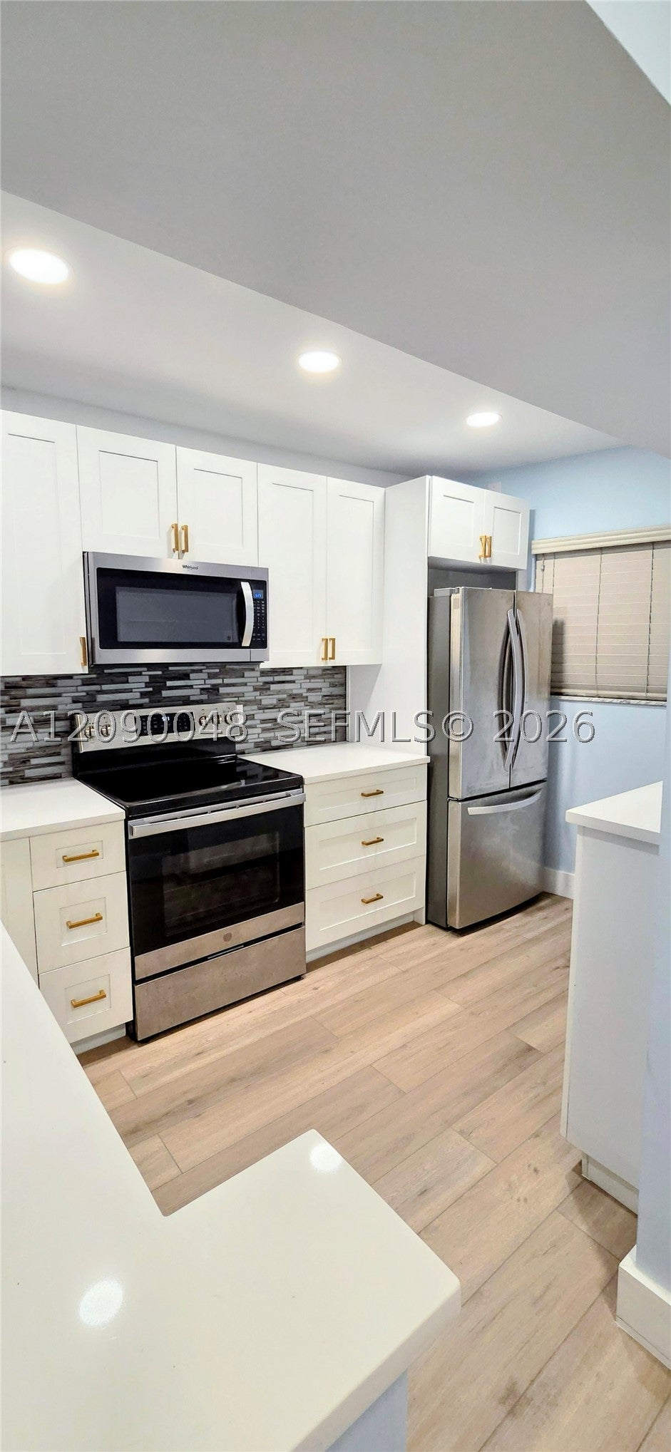 Photo of 3605 S Ocean Blvd #210, South Palm Beach, FL 33480 (MLS # A12090048)
