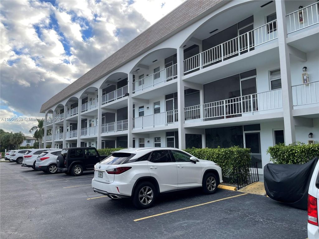 Photo of 501 Blue Heron Dr #107-A, Hallandale Beach, FL 33009 (MLS # A11504039)