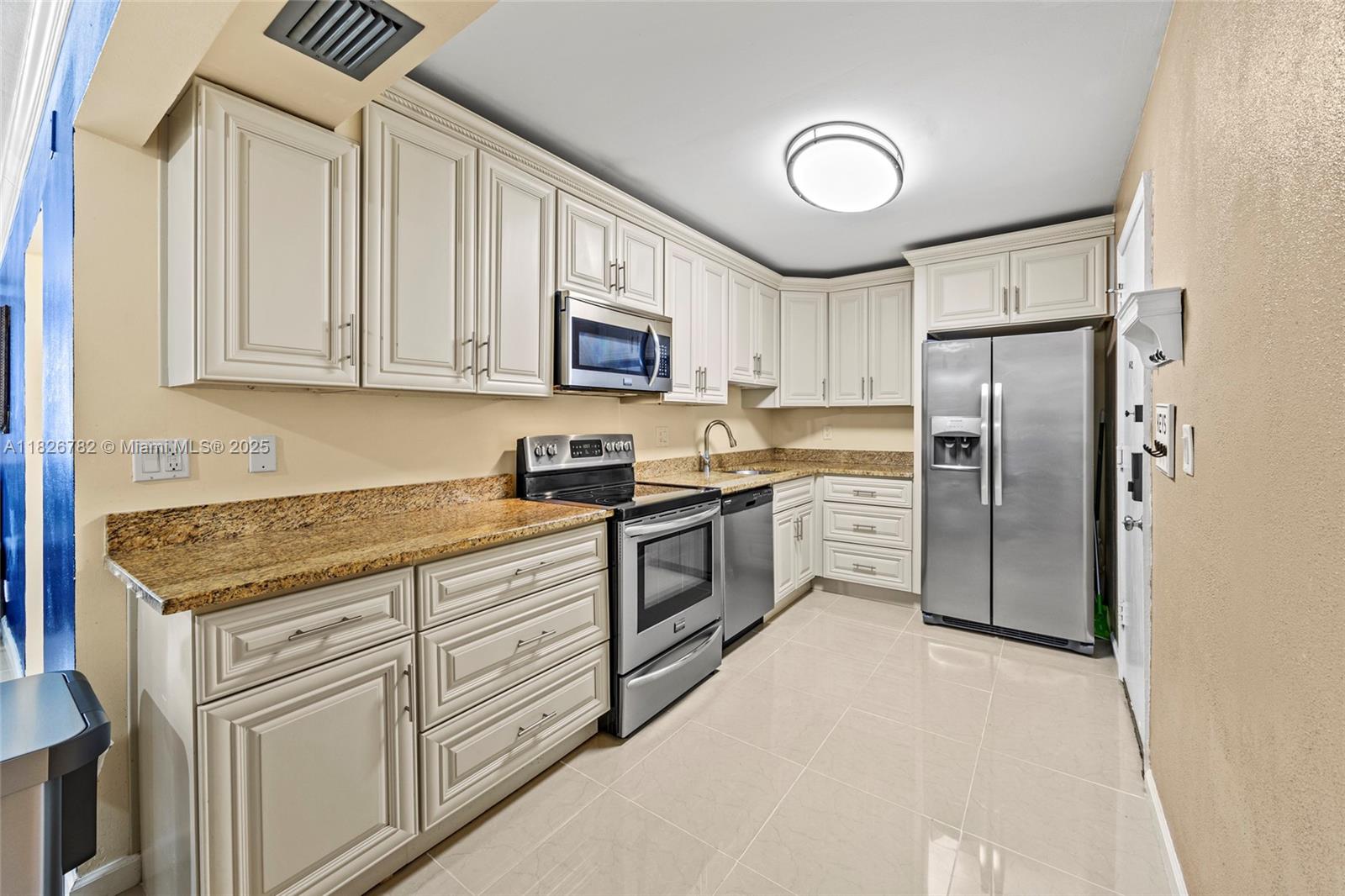 Welcome to your gorgeous condo with 1st floor interior entrance. Upon entry you are welcomed by stainless steel appliances in the kitchen, tiled floor, granite countertops, built-in microwave, dishwasher, & soft closing cabinets. Beautiful screened in patio that overlooks the courtyard for bbq & steps away from the pool. The primary bedroom offers a private updated bathroom & a walk in closet.  There is a newer front loading washer and dryer in unit, a smart nest thermostat, a new copper Freon line for the AC & storage. 1.5 miles to I-95, walking distances to restaurants + shops, & 2.5 miles to Deerfield Beach with a stunning pier.
Along with the pool, there’s also an exercise room, & a billiard room.  With low maintenance fees, & no assessments do not miss out on this amazing property.