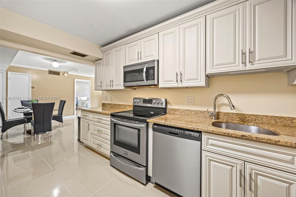 Photo of 1428 SE 4th Ave #146, Deerfield Beach, FL 33441 (MLS # A11826782)