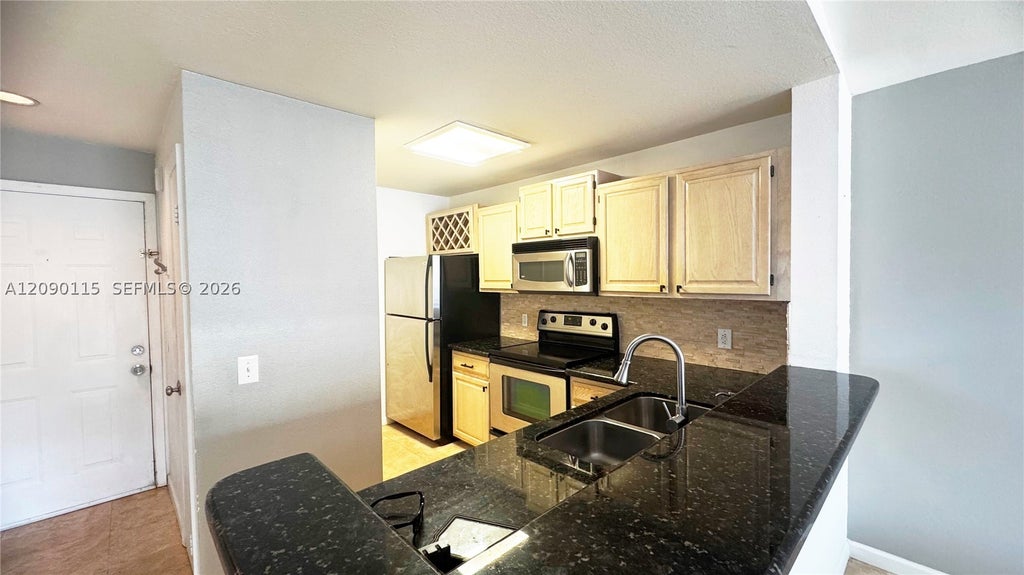 Photo of 1760 Palm Cove Blvd #5-305, Delray Beach, FL 33445 (MLS # A12090115)