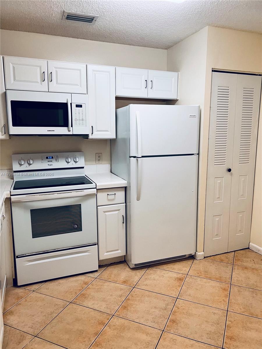 NAPOLI GARDENS AT CORAL S - Residential