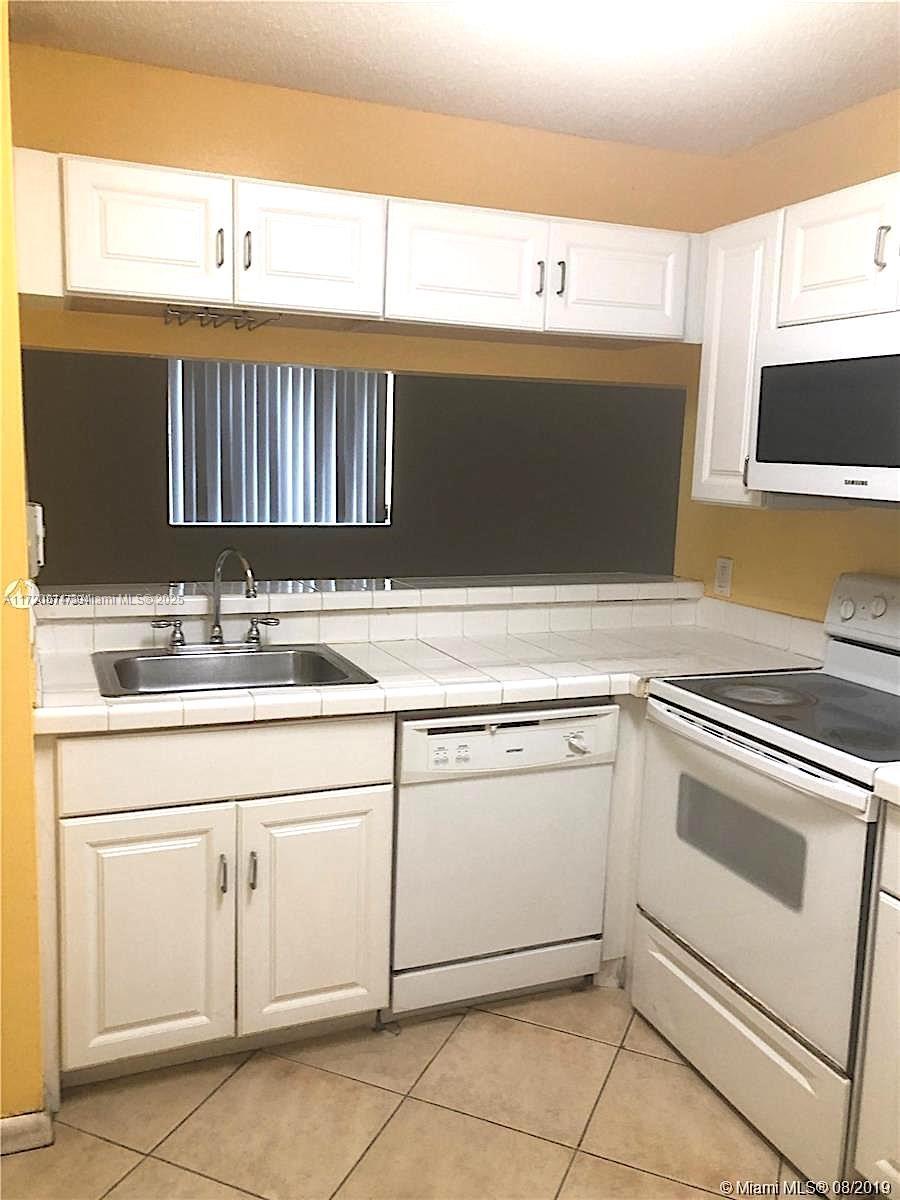 NAPOLI GARDENS AT CORAL S - Residential