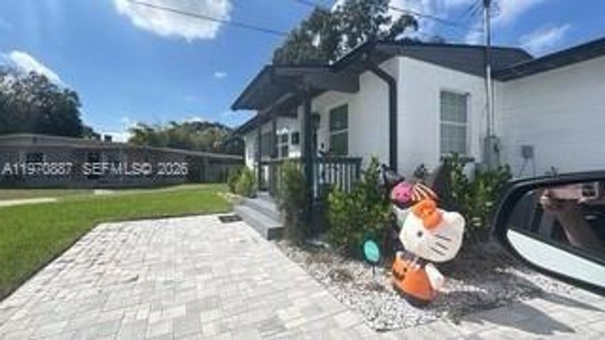 Beautifully renovated 4-bedroom, 2-bathroom home in Orlando featuring designer finishes throughout! This bright, modern residence offers luxury plank flooring, recessed lighting, updated ceiling fans, and an open, airy layout. The stunning kitchen is equipped with shaker cabinetry, stainless steel appliances, a farmhouse sink, a subway tile backsplash, and spacious countertops—ideal for everyday living and entertaining. Both bathrooms have been fully remodeled, showcasing contemporary vanities, upgraded fixtures, and spa-style finishes, including a walk-in shower. Additionally, there is a brand new all-in-one smart washer/dryer. Enjoy a large backyard with direct access to Demetree Park. The home is conveniently located near major roads, shopping, dining, and downtown Orlando.