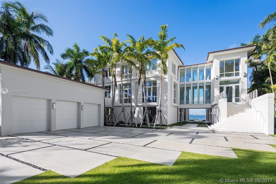 If you are going to live in paradise - LIVE IN PARADISE. TAHITI BEACH ISLAND. Look no further than this immaculate 2017 built contemporary waterfront home with 161 feet on the open bay. 5 BD/5.5 BA estate in one of the most exclusive gated communities. Only 26 residences in this impeccable private neighborhood.  Divine workmanship throughout with 12 ft ceilings, floor-to-ceiling windows, elevator, light wood kitchen cabinetry, office with leather tile flooring, theatre room, garage currently holds 3 cars, with room to hold up to 6 if lift added. Zen-like Asian inspired partially covered pool & waterfall leading to breezeway with unobstructed views of Biscayne Bay & Downtown Skyline all throughout the Estate.