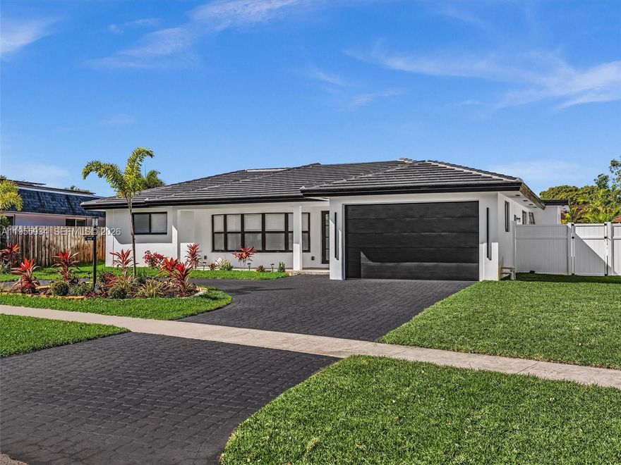 Completely reimagined with no detail overlooked, this stunning home offers the peace of mind of a fully upgraded  property with designer finishes throughout. Featuring a brand-new roof, plumbing, air conditioning unit with updated ductwork, impact windows and doors, and a new electrical panel, this property blends modern comfort with lasting quality.
Enjoy cooking in the beautifully updated kitchen, unwind in the redesigned bathrooms, and appreciate the seamless look of new tile flooring, modern interior doors, and bright recessed lighting.
Step into your backyard oasis featuring a newly built pool with lighting, fresh landscaping, irrigation, and a private PVC fence — ideal for entertaining or quiet relaxation.
Turnkey, modern, and ready for its next owner!