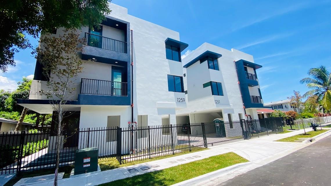 Welcome to your new home! This stunning, brand-new 3-bedroom, 3-bathroom townhouse is perfectly located near Brickell, Calle Ocho, Marlins Stadium, and the airport. With a sleek and modern design, this home boasts quartz countertops, stainless steel appliances, and an open concept layout. The spacious 9-foot ceilings and impact windows throughout create a bright and airy atmosphere. Enjoy the convenience of a 2-car garage and the security of controlled access. Be the first to live in this immaculate space, complete with a washer and dryer in the unit. Don't miss the chance to schedule a private tour and make this luxurious townhouse your new home.
