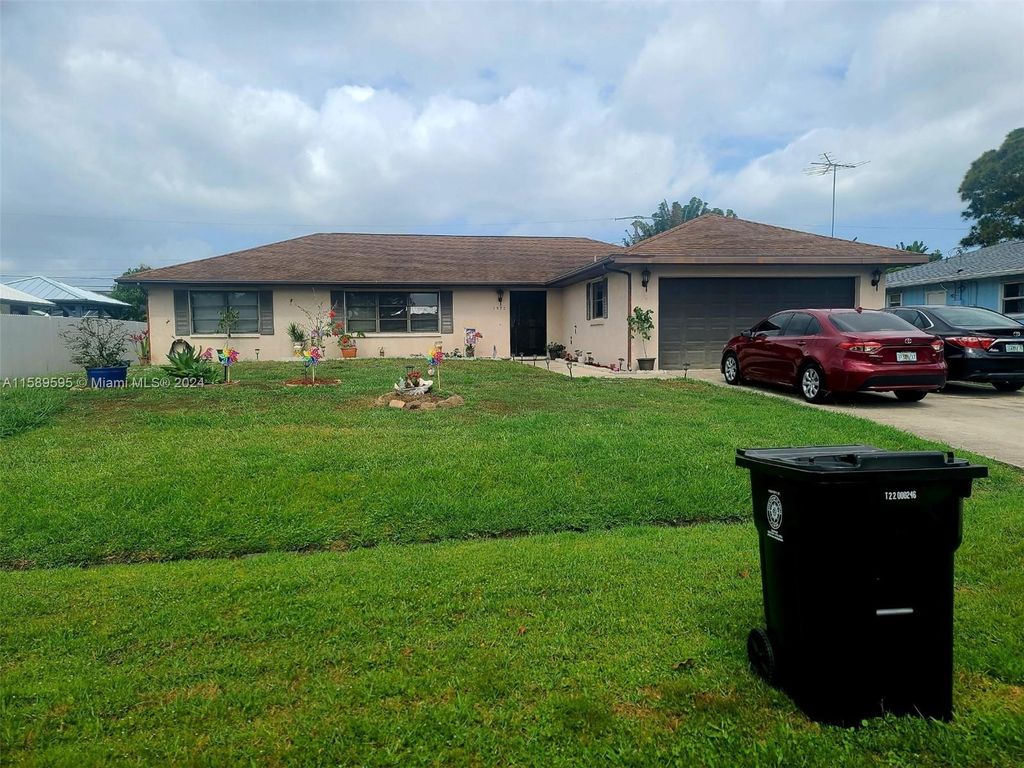 Photo of 1572 SE Ladner St, Port Saint Lucie, FL 34983 (MLS # A11589595)