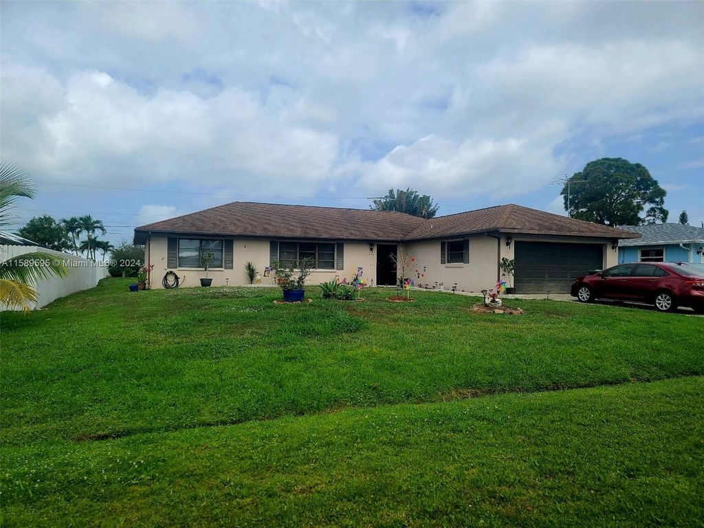 Photo of 1572 SE Ladner St, Port Saint Lucie, FL 34983 (MLS # A11589595)