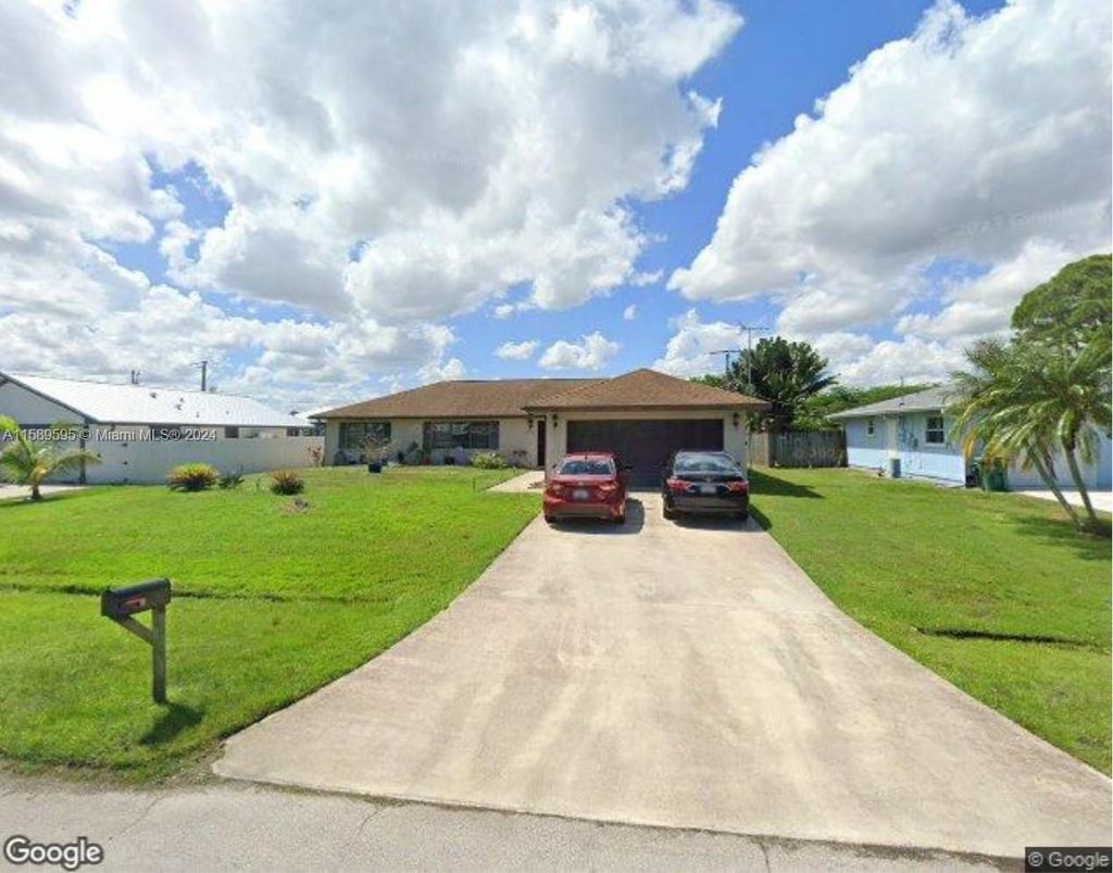 Photo of 1572 SE Ladner St, Port Saint Lucie, FL 34983 (MLS # A11589595)