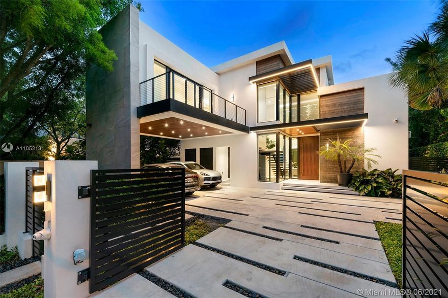 Exquisite & Elegant!This sleek modern "smart home" masterpiece w/ unmatched stunning appointments, superlative quality and over the top features for all luxurious comforts. Dramatic and distinctive architectural design by Raymond Pacheco. Concrete Roof, soaring ceilings, designer porcelain and hardwood floors throughout! Floor to ceiling high impact windows and doors. Stunning Epicurean Gagenau kitchen with all top of line appliances. Spa inspired lavish master suite with sumptuous bath, large ensuite bedrooms w/open vistas! Artistic blending of indoor and outdoor use of space surrounded by the lush landscaping & crafted feast for the eye in every turn of the property! Solar heating. Inviting saline heated pool! Summer kitchen and much more! Sensational!   See Broker's Remarks for Appts.
