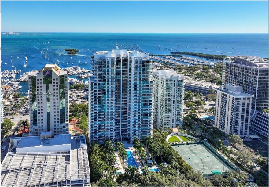 Discover the epitome of luxury in this rarely available, highly desirable East facing unit w/breathtaking views from every room. Enter thru your private elevator landing to a light filled living area that leads to an oversized balcony overlooking beautiful Biscayne Bay. Boasting a gourmet kitchen w/top-of-the-line appliances, a spacious primary suite w/spa like bath & walk in closet & large guest room w/ensuite bath. Enjoy a resort like pool w/cabanas & summer kitchen, fitness center & spa, tennis, pickleball & basketball court, billiard room, playground, dog park, valet, 24-hour concierge services and more. Centrally located in Coconut Grove, just steps away from parks, marinas, shops & restaurants. Unit comes w/1 assigned parking space, unlimited valet & air conditioned storage unit.
