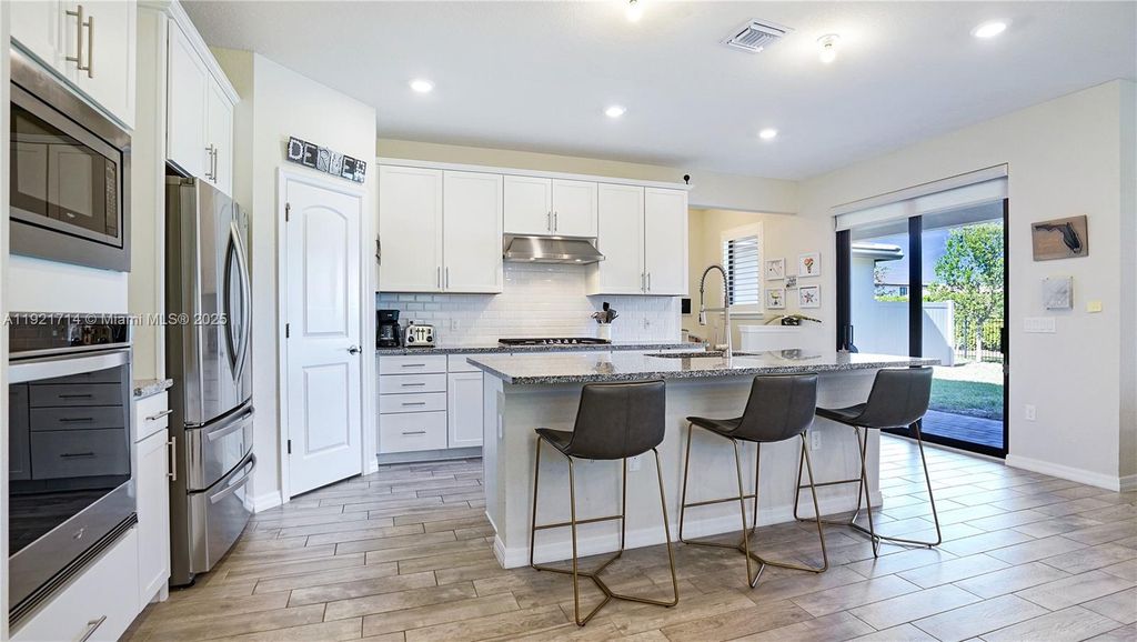 Photo of 8605 Patron Ln, Lake Worth, FL 33467 (MLS # A11921714)