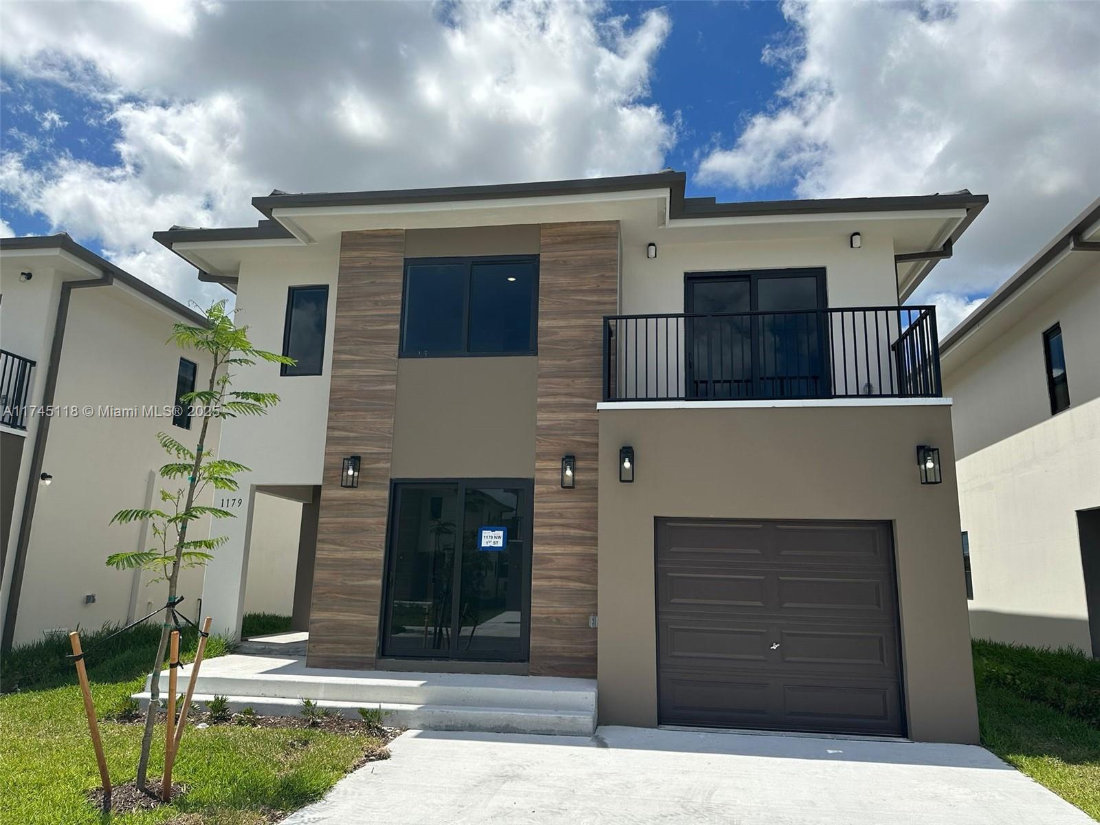 BEAUTIFUL CONSTRUCTION, 2 story home, 5 beds 4.5 baths, garage & fenced backyard. Located in a great residential community in Florida City. Beautiful open kitchen with s/s appliance, stone counter top, double sink. Front load full side washer & dryer. Title flooring throughout the house, impact windows. This house offers a full bedroom with closet & bathroom downstairs . Master room with walking closet and double sink in bathroom. Excellent finishes throughout the house. YOU HAVE TO SEE IT!!!!! All information is approximate and not warranted or guaranteed.TENANT OCCUPIED UNTIL 5/31/26. GREAT INVESTMENT OPPORTUNITY!!