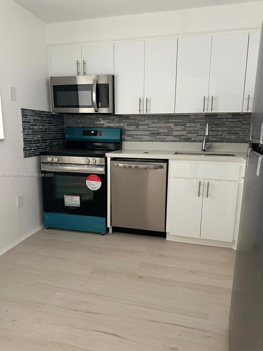 WOODSIDE APTS CONDO - Residential