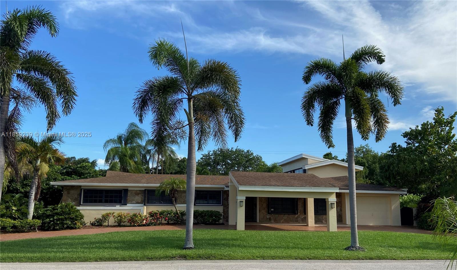 A stunning pool home set on an expansive 16,675 sq. ft. lot in a prime location with no HOA—perfect for RVs, boats, and more. This beautifully maintained residence features soaring vaulted ceilings with intricate tongue-and-groove woodwork, creating warmth and architectural charm. The open floor plan offers spacious living and dining areas filled with natural light, a well-appointed kitchen, and 3 (can be easily converted back to 5) comfortable bedrooms, including a generous primary suite with loft. The private backyard oasis with a sparkling pool, pergola, and ample green space for entertaining or expansion. Located near top-rated schools, shopping, dining, and major highways, this property combines elegance, functionality, and freedom—truly a rare Miami find.