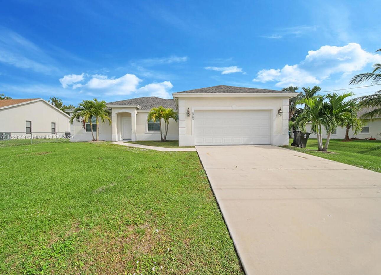 Back On The Market!! This captivating 4-bedroom, 3.5-bath CBS home in a desirable neighborhood near Saint James. This recently renovated property, constructed in 2019, has no HOA or deed restrictions. The thoughtfully designed triple split plan ensures comfortable living, making it perfect for large families and entertaining with its spacious open concept. The home features a formal dining area, a large kitchen nook, and a private second en-suite. Upgrades include a built-in entertainment wall with recessed lighting, paddle fans, quartz countertops, stainless steel appliances, and custom cabinets. The oversized master bedroom offers two walk-in closets and a luxurious master bath. Enjoy the covered lanai overlooking a semi-private backyard with ample space. Don't miss this opportunity!