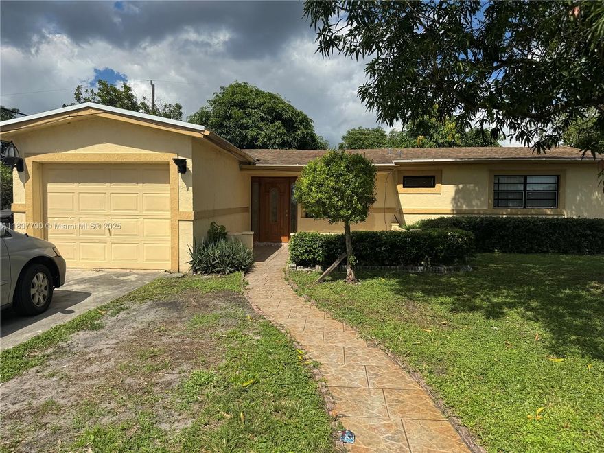 Cozy and affordable efficiency available in Lauderdale Lakes! This spacious unit features a functional kitchenette with modern cabinets, an electric stove, a microwave, and a refrigerator to be installed, and a tiled backsplash.  The efficiency also features a full bathroom with a tiled shower area and a comfortable sleeping/living space, complete with a ceiling fan and natural lighting.  Located in a quiet residential neighborhood with easy access to major highways, shopping, dining, and public transportation.  Water and electricity are included.  Suitable for a single occupant.