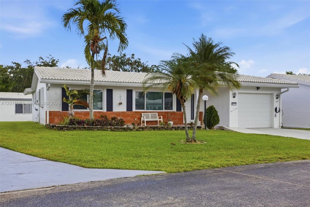 Photo of 9011 NW 15th Pl, Plantation, FL 33322 (MLS # A12015073)