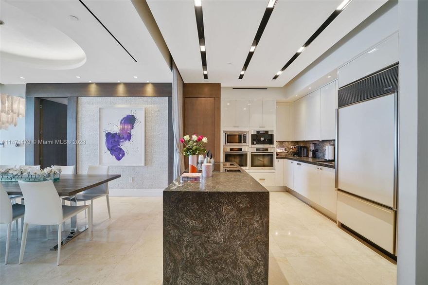 One of a kind spectacular Beach House direct ocean view 2 bed+den unit with 11’ ceilings at Carillon Miami Wellness Resort, a premier oceanfront luxury property. Custom designed with unparalleled finishes & appointments.  Numerous upgrades & meticulous details sparing no expense, including Mother of Pearl walls, elite marble flooring, custom counter tops, imported wood, Sonos Wireless Music System, designer fixtures & lighting, retractable downdraft range ventilation, & so much more. 70,000 sqft fitness & spa center. Classes 7-days-wk from morn until evening. Enjoy a myriad of wet therapies-relax mind, body, & soul. 4 pools, restaurant, poolside cafe, beach service, salon, boutique, wellness staff, 24-hour sec, valet. Bring your most discriminating buyers.