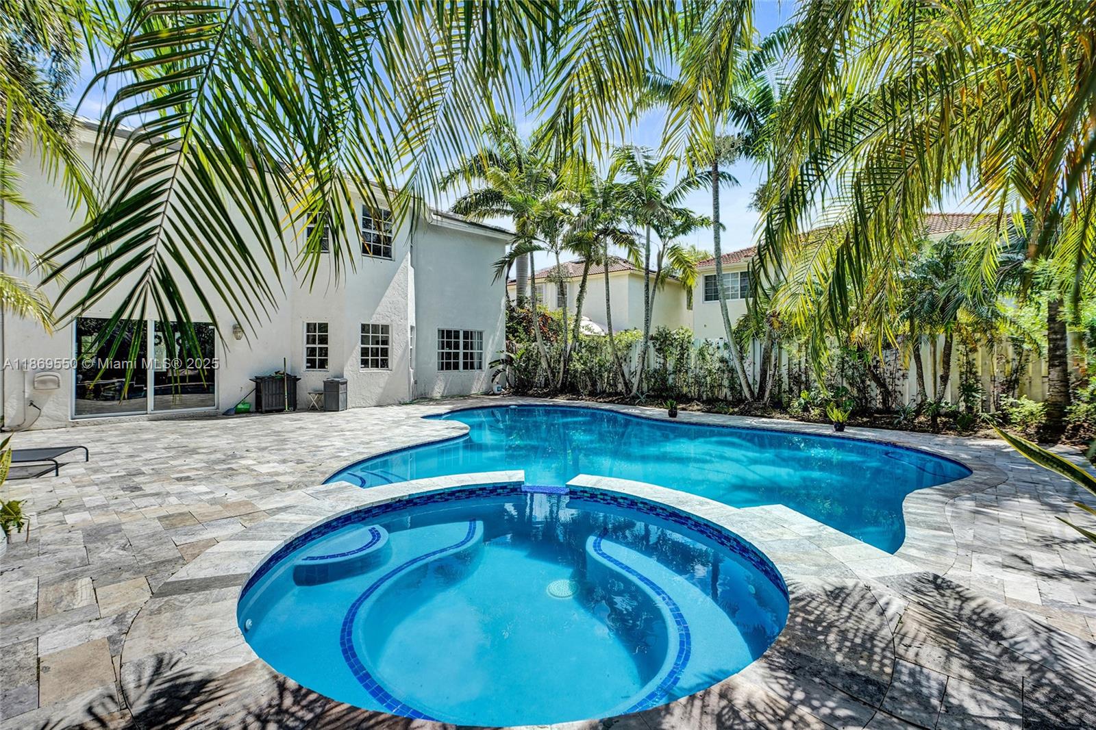 Splash Into Weston Living! Almost 1,800 sf of outdoor paradise! Live like a true Floridian: sparkling refinished Diamond Brite pool, jacuzzi & brand-new travertine deck make your backyard feel like a resort. Major updates? 2024 roof, 2021 A/C, impact garage door & shutters. Inside, a rare layout offers a bedroom & full bath downstairs + where do you score a 4 bed, 3 full bath upstairs at this price? The kitchen is pure eye candy! An oversized quartz island flaunting waterfall edges & tons of storage. Sleek appliances, oversized neutral tile & sultry water vapor electric fireplace set the mood. Bonus perks: new laundry, natural gas water heater, low $154/mo HOA & Bonaventure Town Center amenities (pickleball, tennis, gym & more!). Zoned for A-rated schools. Seller says bring offers..FAST!