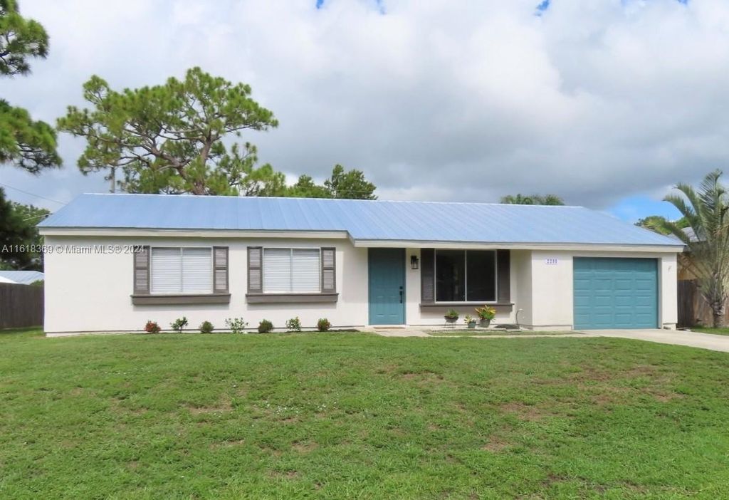 Photo of 2290 SE Glover St, Port Saint Lucie, FL 34984 (MLS # A11618369)