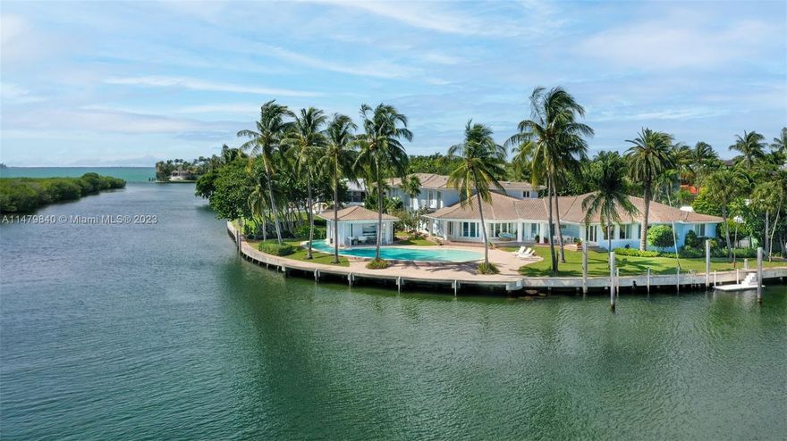 Nestled on one of Key Biscayne’s most exclusive streets, this island estate boasts 300+ FT of waterfront on a peninsula, with a sweeping 180-degree panorama of sunsets over the Cape Florida State Park. Ideal for Boaters, it accommodates a 100+ FT yacht & direct Biscayne Bay access. The 29,100SF lot equals two waterfront lots by Key Biscayne’s standards, also allowing for jet skis, kayaks, paddleboards & open green space for kids’ play. Enjoy added privacy with no neighbors across the waterway, frequented by dolphins & manatees. This family-friendly home has a Feng shui design that creates a harmonious flow of energy & allows for a constant breeze, best enjoyed from the gazebo. Designed for resort-style living with exceptional indoor-outdoor spaces, it's the ideal retreat for island living.