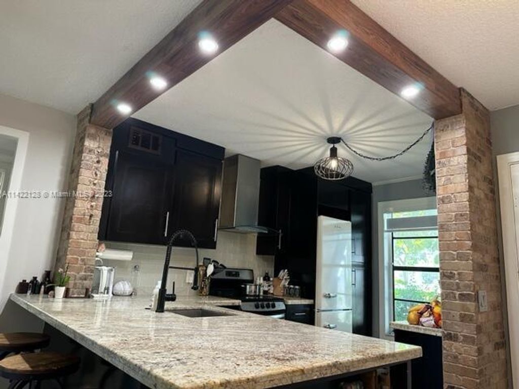 Photo of 204 Lake Pointe Dr #108, Oakland Park, FL 33309 (MLS # A11422128)