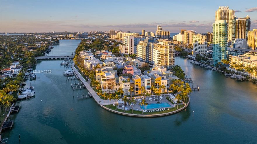 Welcome to an unparalleled opportunity to own the last trophy corner waterfront home on prestigious Aqua Island. This private and gated community epitomizes island living. A serene escape w/ water views & expansive waterfront terraces on every level. Enjoy mesmerizing sunsets that will take your breath away. With 4,500+ interior sqft this 5-bed, 5.5-bath w/ 7,000 total sqft, has 10’ ceilings, large art walls, natural light, rooftop, private elevator, 2 car garage, & atrium creating a harmonious blend of indoor and outdoor living. Residents have exclusive access to two pools, a spa, a 6,000sqft fitness center, concierge & 24-hour valet. One block from the ocean & walking distance to La Gorce. Set out to sea from your deeded dock & embrace the vibrant lifestyle that Miami Beach has to offer.