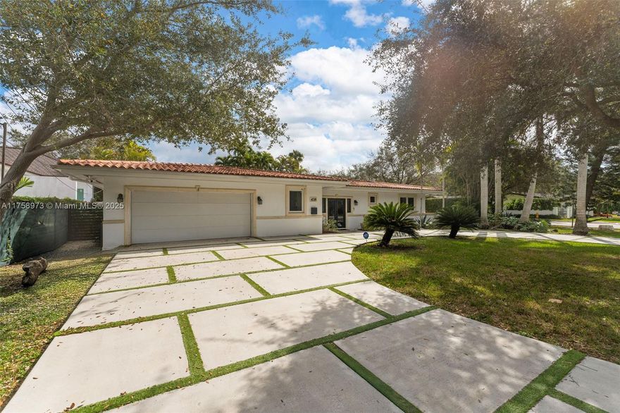 Located in the heart of Coral Gables, this beautifully remodeled 4BR / 4.5BA home is move-in ready, offering elegance, functionality, and a smart layout. The spacious design features four en-suite bedrooms, a guest bath, and ample storage—perfect for families or guests. The open living and dining areas flow seamlessly into a sleek, modern kitchen with a large island, ideal for everyday gatherings. With impact windows, updated A/Cs, smart appliances, and stylish finishes throughout, everything is in top condition - no updates needed. Outside, enjoy a lush backyard with a pool and plenty of parking, including a garage. Just minutes from top schools, restaurants, grocery stores, and more, this home sits in a vibrant, walkable neighborhood. A true gem - just unpack and start living!