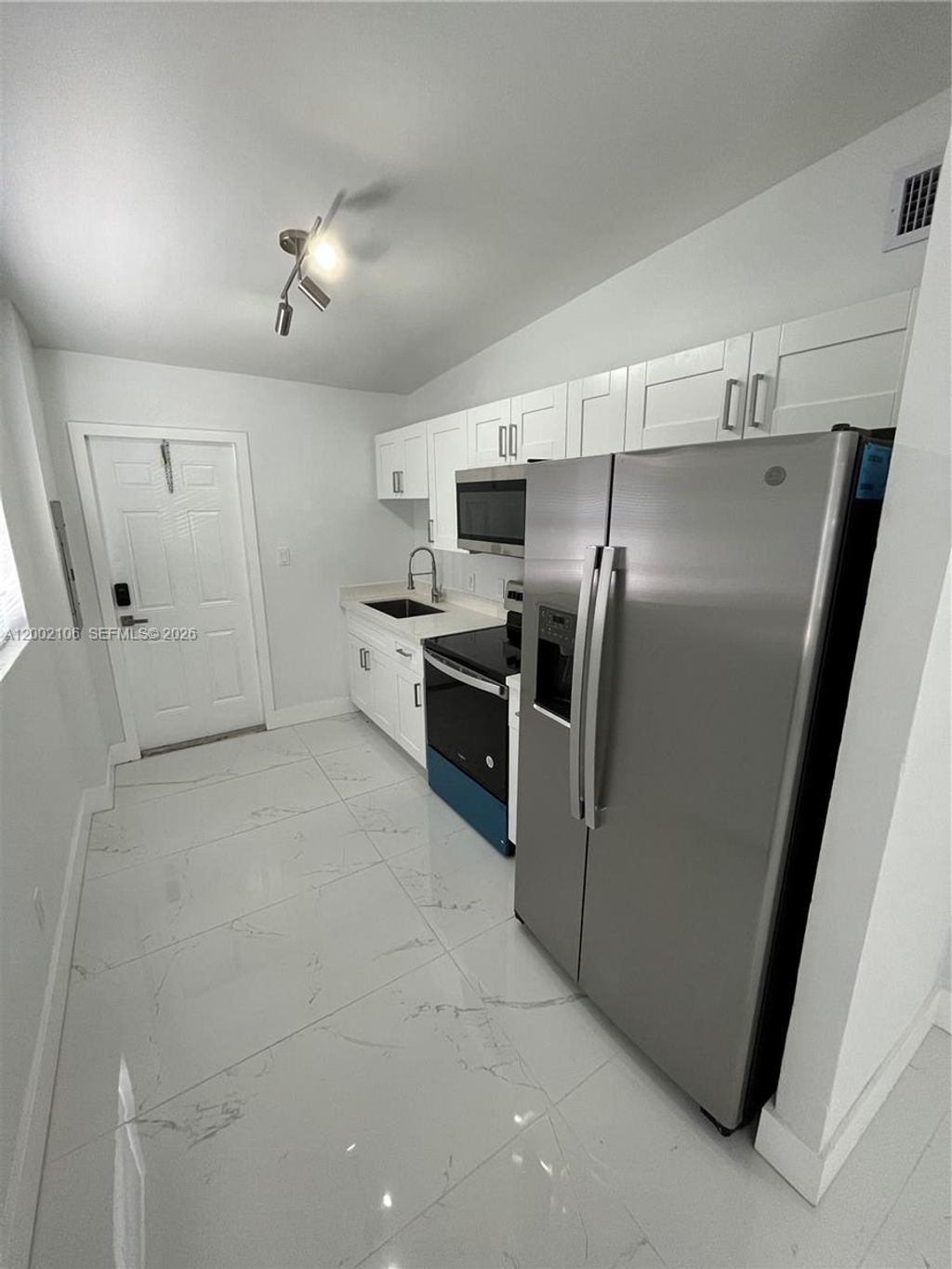 Photo of 2726 NW 4th Ct, Pompano Beach, FL 33069 (MLS # A12002106)