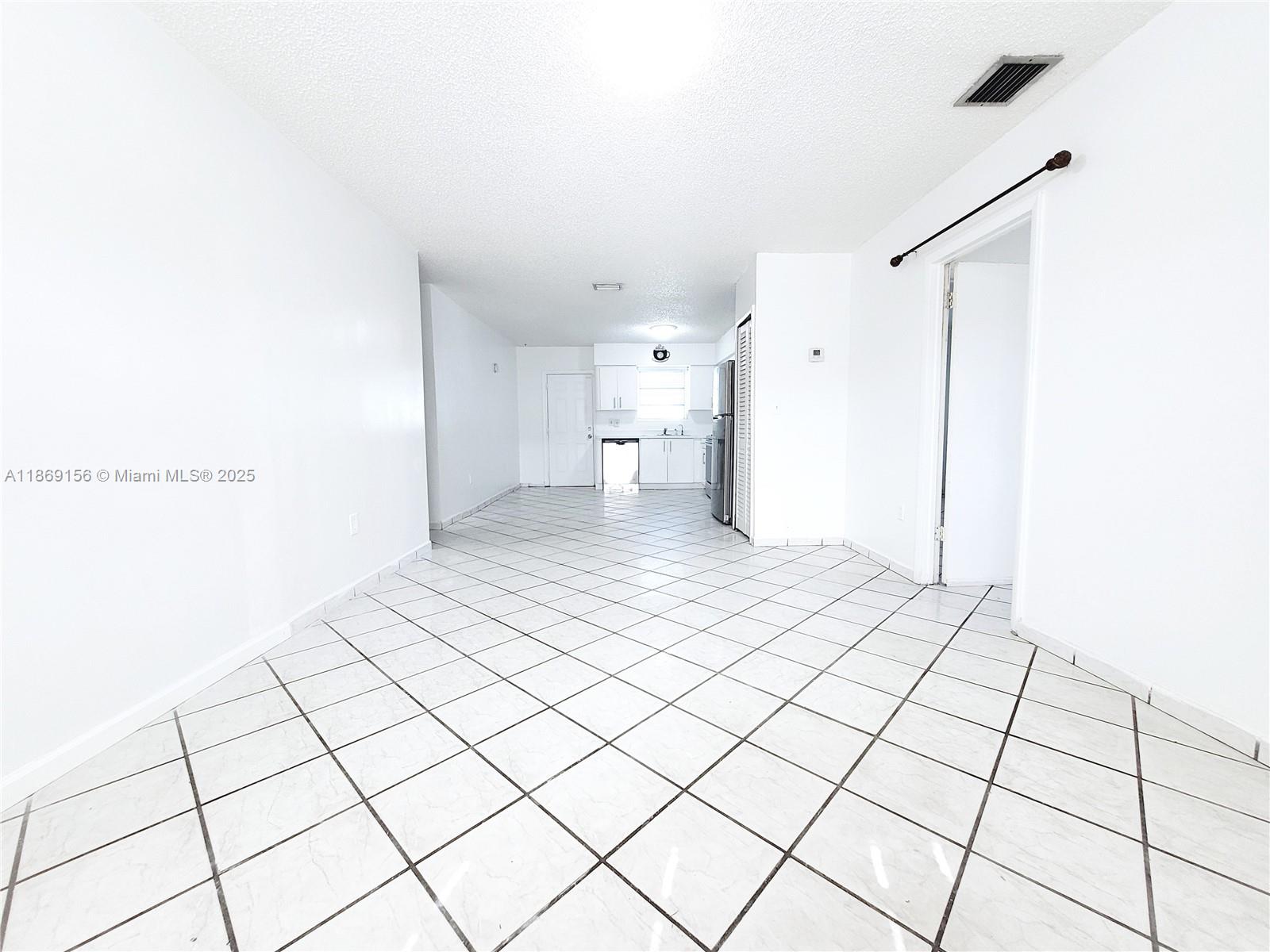 14002 NE 6 AVE .