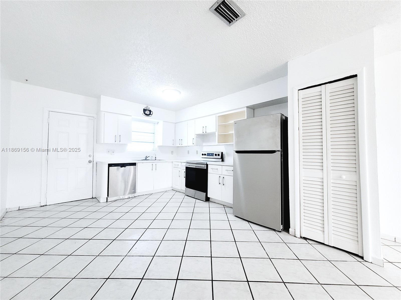 14002 NE 6 AVE .