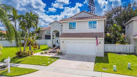 Photo of 1061 NW 190th Ave, Pembroke Pines, FL 33029 (MLS # A11889191)